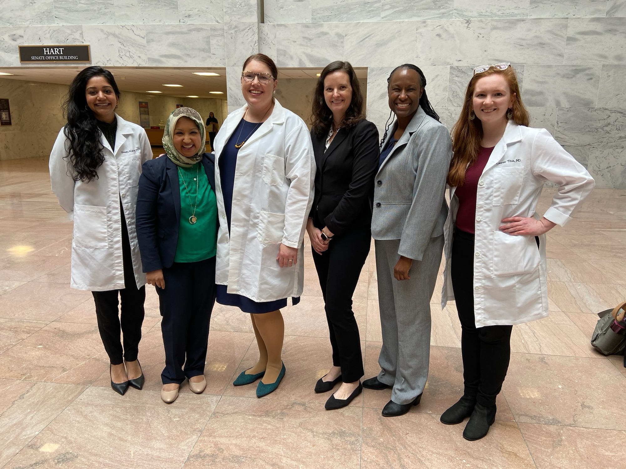 Physicians in white coats at the Hart Senate Office Building